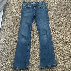 Dark blue low rise boot jeans